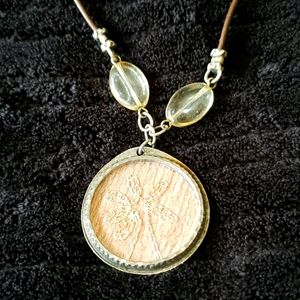 Gold flower inlaid on shiny brown silk necklace